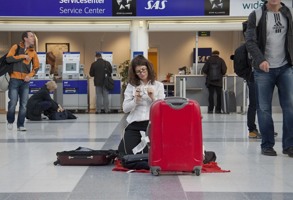 Tanja Ostojić, Misplaced Women?, 30 min performance at Bergen International Airport, Norway, 2011. Photo: Jannicke Olsen. Copyright: Tanja Ostojić. Organised by Stiftelsen 3,14